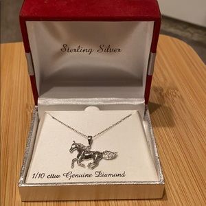 Sterling silver and diamond horse necklace in box